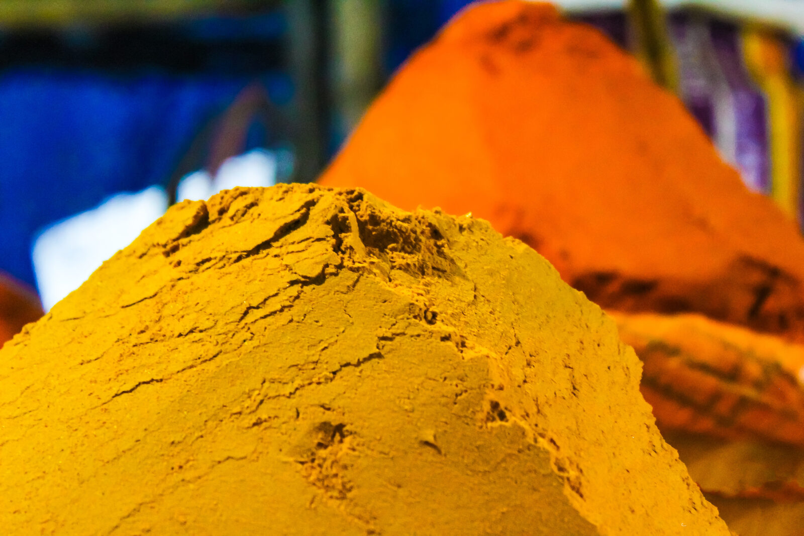 Bowls of colourful whole and ground Indian spices